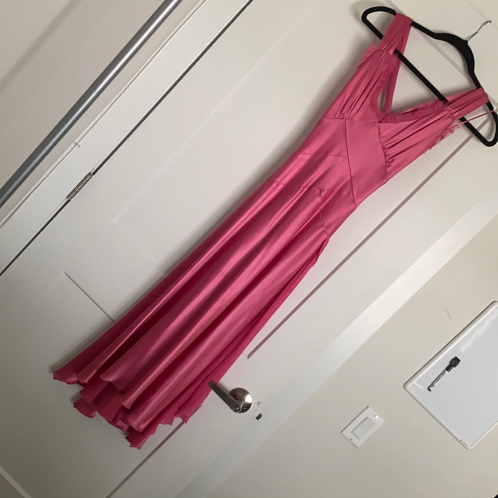 Don’t remember the brand. Pink gown great for a wedding. Worn once